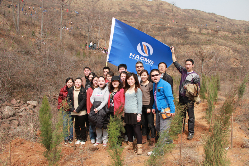 Haomei planted 100 trees in Xingyang Vale
